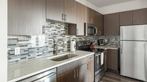 Fridge, dining tables - Landing | Incredible 1BD, Pool, Gym (Dallas)