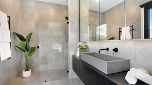 Shower, hair dryer, towels