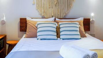 Premium bedding, down duvets, minibar, in-room safe