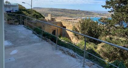 🌊 Coastal charm awaits! Elegant Mellieħa maisonette with stunning sea views over Għadira Bay. ☀️🏡