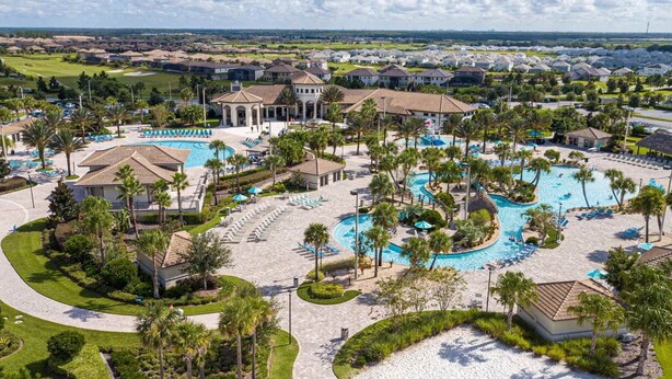 A resort with multiple swimming pools, a golf course, and a large pavilion. - Luxury 6BR Villa w/ Private Pool • Disney (Davenport)