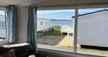 Safari Sunset caravan + sea view at Rockley Park, Poole Harbour. Dogs stay free!