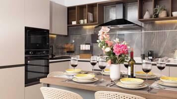 Coffee/tea maker, fridge, oven, stovetop