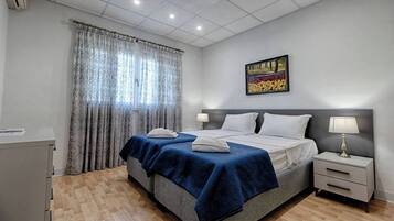 2 chambres, fer et planche Ă repasser, Wi-Fi gratuit, draps fournis