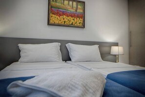 2 habitaciones, tabla de planchar con plancha y wifi gratis