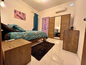 1 dormitorio, tabla de planchar con plancha, wifi gratis y ropa de cama