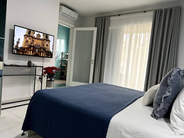 Iron/ironing board, free WiFi, bed sheets