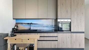 Microwave, stovetop, dishwasher, coffee/tea maker