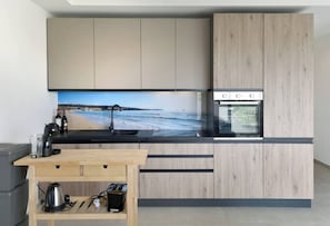 Microwave, stovetop, dishwasher, coffee/tea maker - Relax & unwind in Mellieħa! A bright one-bedroom retreat near golden sands, seaside cafés & Maltese charm. (Il-Mellieħa)