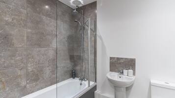 Shower, hair dryer, towels, soap