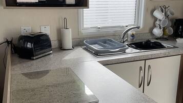 Apartment | Private kitchen | Fridge, microwave, oven, stovetop