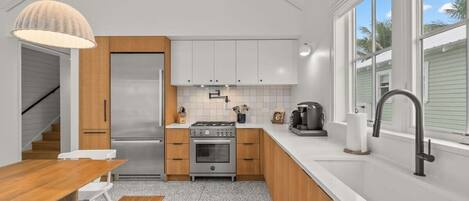 Coffee/tea maker, fridge, microwave, oven