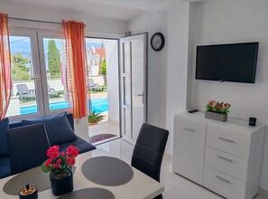 Apartment (Two Bedroom Apartment with Terrace an) | Living room | 32-inch flat-screen TV with digital channels