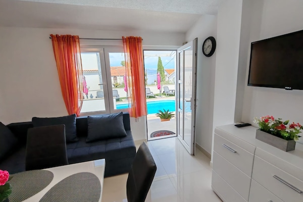 Apartment (Two Bedroom Apartment with Terrace an) | Living room | 32-inch flat-screen TV with digital channels