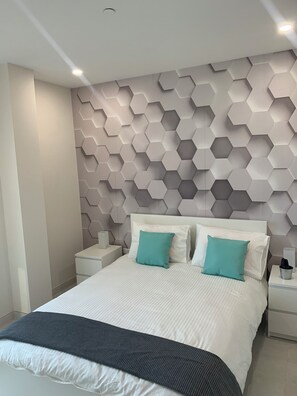 2 dormitorios, tabla de planchar con plancha, wifi gratis y ropa de cama