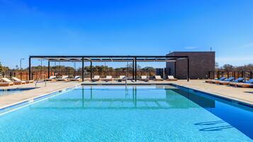 2 outdoor pools, open 9:00 AM to 10:00 PM, pool umbrellas, pool loungers