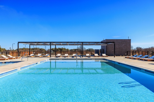 2 outdoor pools, open 9:00 AM to 10:00 PM, pool umbrellas, pool loungers