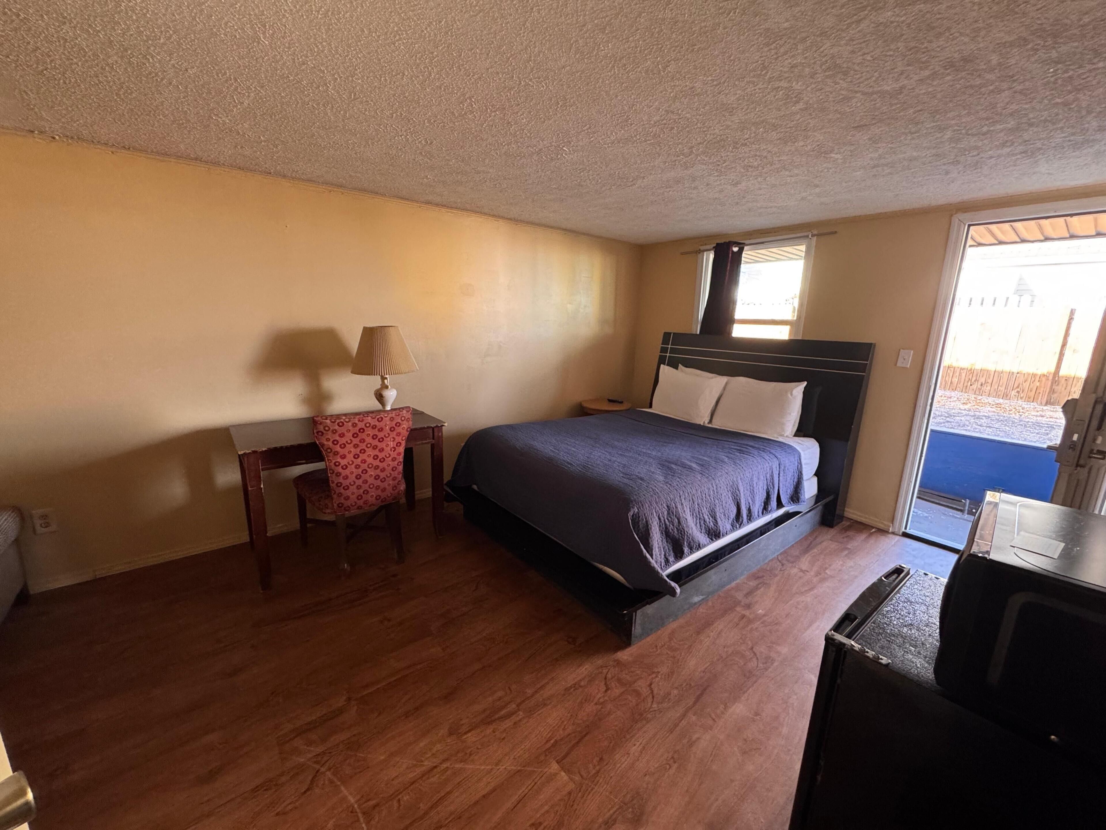 Deluxe Room, 1 Queen Bed, Non Smoking | Desk, bed sheets
