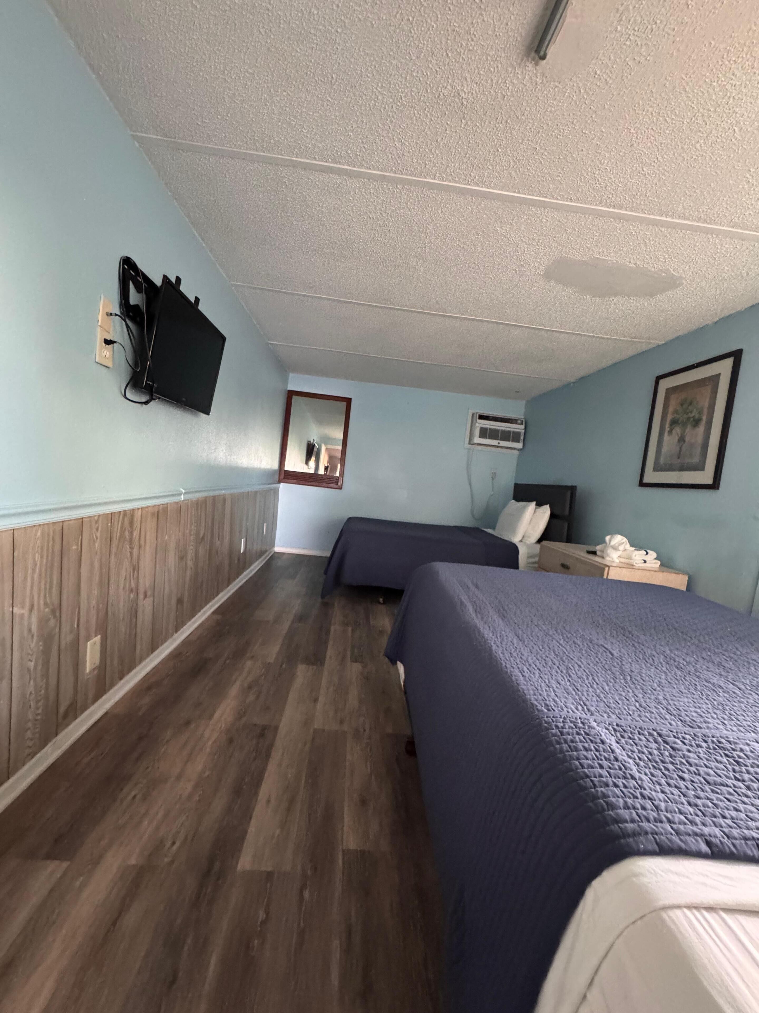 Premium Room, Multiple Beds | Desk, bed sheets