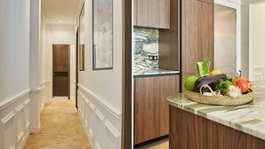 A hallway with a wooden floor and a door at the end. - Superb Apartment on the Champs Elysees (Paris)
