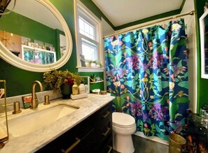 Shower, eco-friendly toiletries, towels, soap