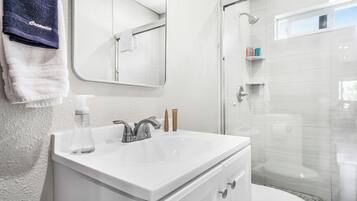 Shower, hair dryer, towels, soap