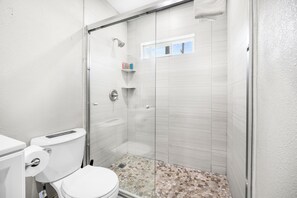 Shower, hair dryer, towels, soap