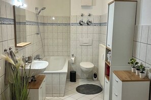 Hair dryer, towels, soap, toilet paper