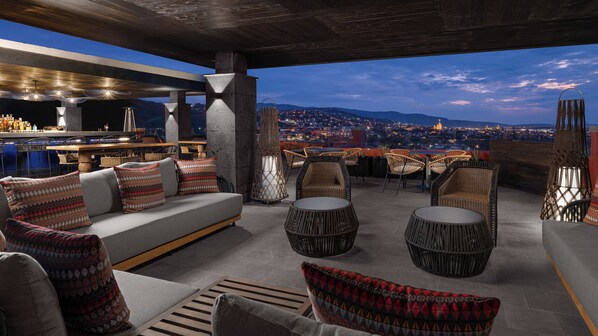3 bars/lounges, rooftop bar