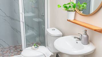 Shower, rainfall showerhead, designer toiletries, towels