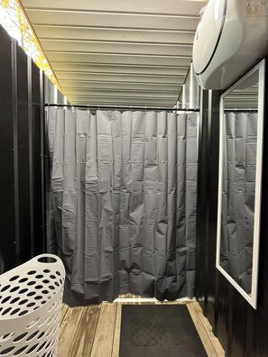 Shower, towels, soap, shampoo