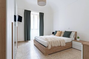 1 dormitori, planxa i posts de planxar, wifi gratuïta i roba de llit 