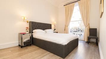 Apartamento conforto | Cortinas blackout, ferros/tábuas de passar roupa, Wi-Fi de cortesia