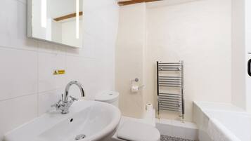 Hair dryer, towels, soap, toilet paper