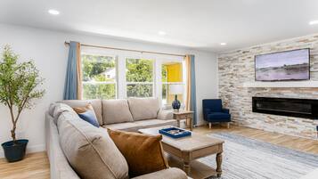 Smart TV, fireplace, foosball