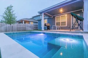 Outdoor pool, a heated pool - 4BR/3.5BH Private Pool: 5M Airport, F1 & 2-Story (Austin)