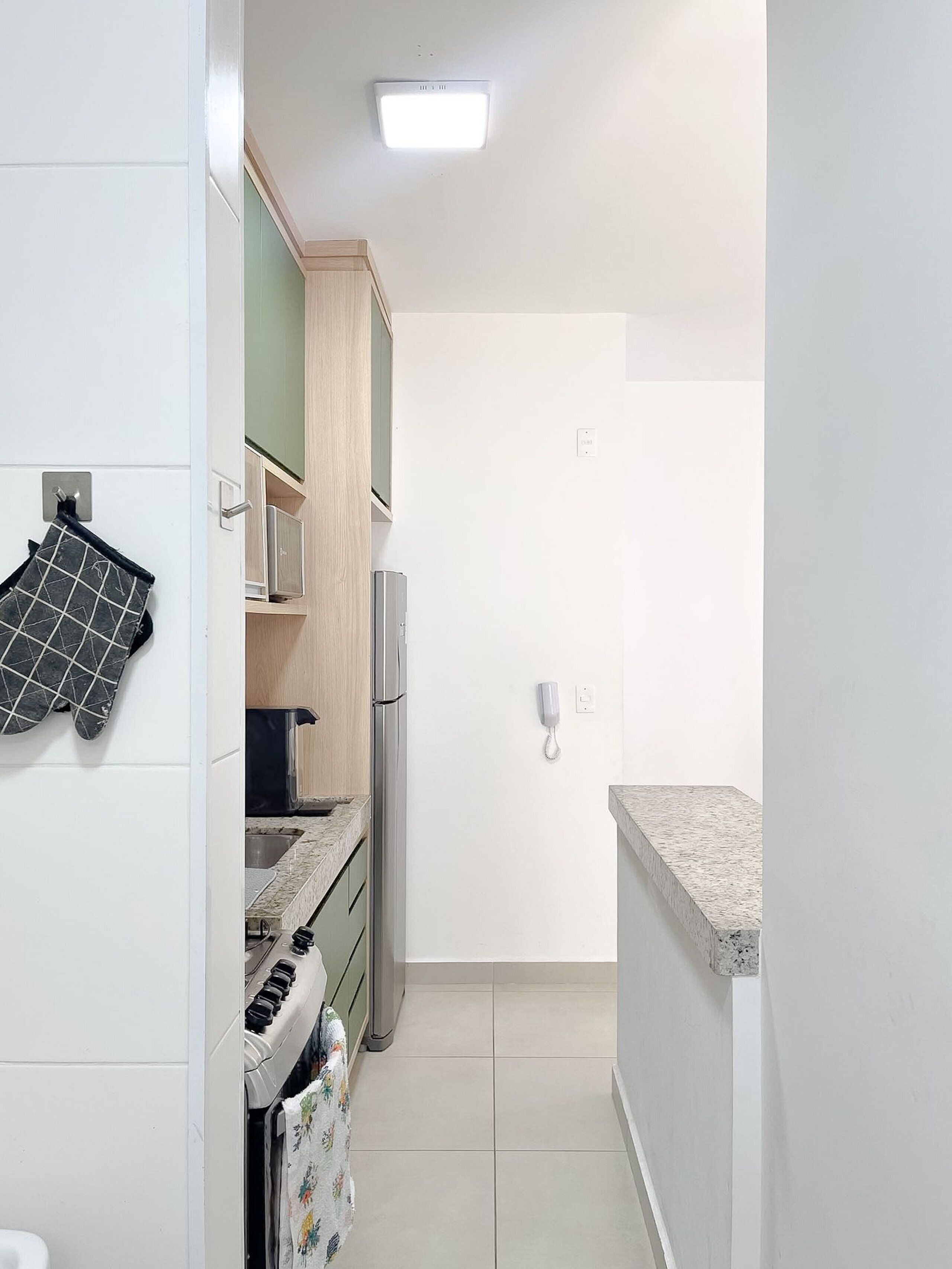 Apartamento | Cocina privada | Cafetera o tetera, microondas, licuadora y utensilios de cocina