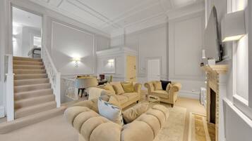 Apartamento superior | Área de estar | TV LCD 40 polegadas com canais digitais