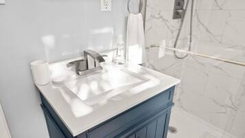 Hair dryer, towels, toilet paper