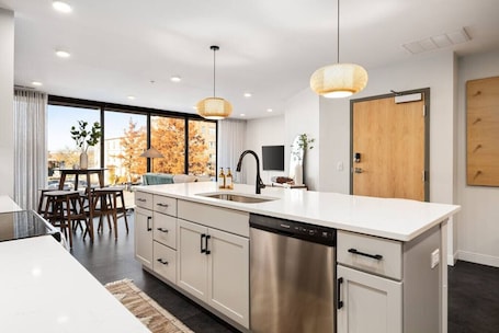 Fridge, microwave, oven, stovetop. Modern 2 Bed in the Heart of Downtown Bloomington
