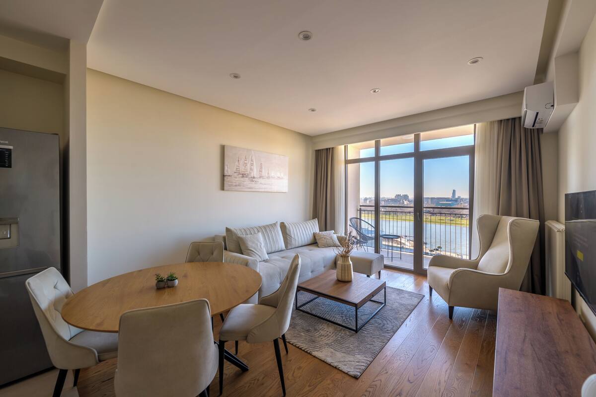 Apartamento, 1 quarto, vista para o rio | Área de estar | TV LED