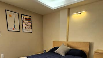 Deluxe Studio Suite, City View | In-room safe, individually decorated, desk, blackout curtains