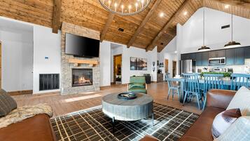 Smart TV, fireplace, books, stereo