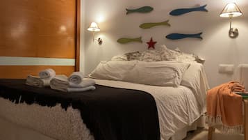 3 slaapkamers, een bureau, een strijkplank/strijkijzer, reisbedje