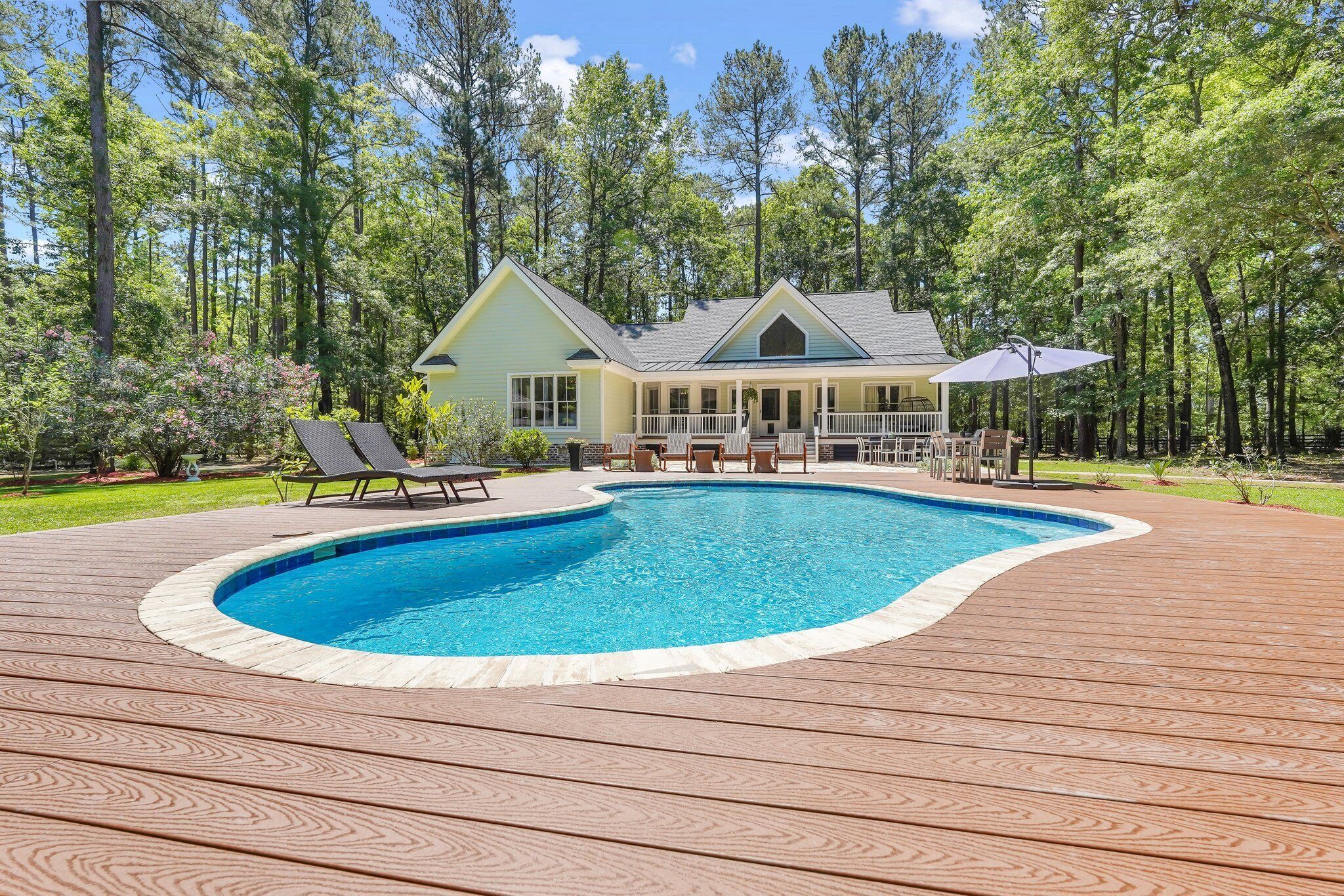 Peaceful gated private 4-Acre property w/ pool, fire pit, and game room