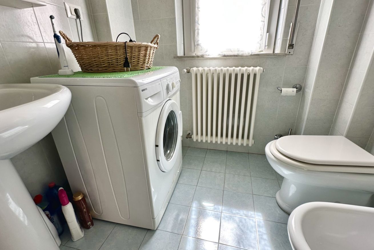 Ducha, bidet, toallas