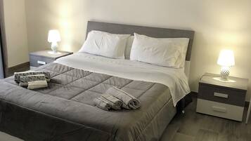 1 habitación, caja de seguridad en la habitación y ropa de cama