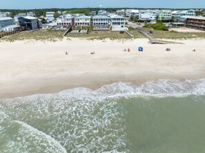 On the beach, sun loungers, beach towels