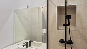Shower, hair dryer, towels
