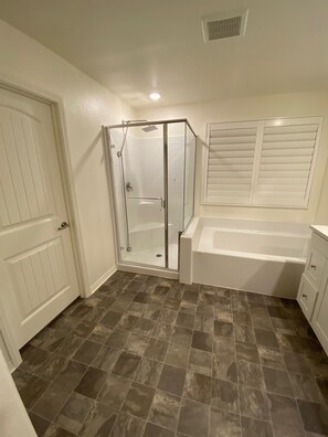 Shower, towels, soap, toilet paper